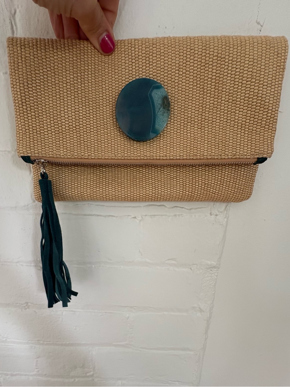 Uno Alla Volta Foldable Woven Straw Clutch with suede Teal Tassel - Italy